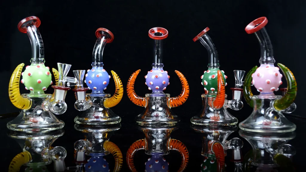 Several glass bongs made of Northstar glass rods have different shapes and rich colors